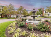 Thumbnail 50 of 57 - This is a photo of the fluntain in the roundabout on Village Drive in front of the leasing office at Washington Park Apartments in Centerville, OH.