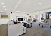 Thumbnail 19 of 54 - the living room has a fireplace and couches at Camino de Oro Apartments, Torrance, CA, 90505