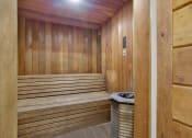 Thumbnail 10 of 26 - a sauna in a wooden room with a garbage can at Casa De Oro Apartments, Torrance, 90505
