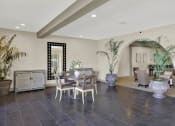Thumbnail 15 of 36 - the dining room is open to the living room and kitchen at Copa Ladeene Apartments, California