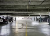 Thumbnail 36 of 36 - a parking garage with cars and a sign that says have a nice day at Copa Ladeene Apartments, Torrance, CA