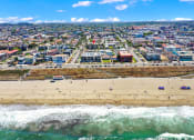 Thumbnail 9 of 18 - an aerial view of the beach and the city  at Royal Towers Apartments, Redondo Beach, CA