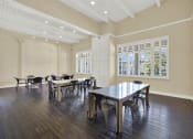 Thumbnail 16 of 55 - a dining room with a table and chairs at Willow Tree Apartments, Torrance