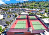 Thumbnail 14 of 55 - a view of the tennis courts on the roof of a building at Willow Tree Apartments, California, 90505