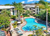 Thumbnail 4 of 55 - a view of the pool at amphora resort amenities at Willow Tree Apartments, Torrance, CA, 90505