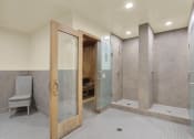 Thumbnail 18 of 55 - a large bathroom with a shower and a chair at Willow Tree Apartments, Torrance
