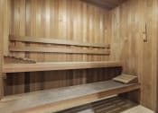 Thumbnail 19 of 55 - a sauna with wooden benches and wooden walls at Willow Tree Apartments, California, 90505