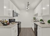 Thumbnail 28 of 54 - Kitchen at Camino de Oro Apartments, Torrance, CA, 90505