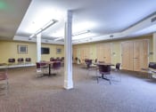 Thumbnail 10 of 14 - a large room with tables and chairs in it