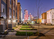 Thumbnail 43 of 43 - a view of the city skyline at night from a street at 5Fifty5, Iowa  