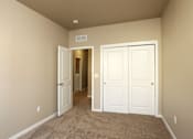 Thumbnail 6 of 14 - Comfortable Bedroom With Accessible Closet at 7th Street Brownstones, Indigo Living, IA, Iowa