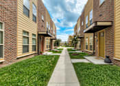 Thumbnail 11 of 14 - Building with Beautiful Walking Paths