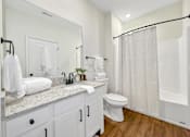 Thumbnail 36 of 51 - a bathroom with a shower and a toilet and a sink at 92West, Iowa, 50266