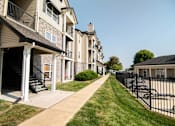 Thumbnail 34 of 51 - an apartment building with a sidewalk in front of it at 92West, West Des Moines, IA 50266  