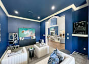 Thumbnail 18 of 51 - a living room with blue walls and white furniture at 92West, Iowa  