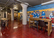 Thumbnail 8 of 23 - Modern Clubhouse With A Game Room at Ballyard Lofts, Indigo Living, IA, Iowa