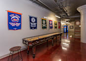 Thumbnail 12 of 23 - Game Room With Shuffle Board at Ballyard Lofts, Indigo Living, 50309