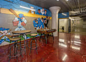 Thumbnail 10 of 23 - Clubhouse with a foosball table at Ballyard Lofts, Indigo Living, 50309