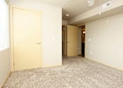 Thumbnail 10 of 20 - Bedroom with a tan carpet and closet at Cedarbrooke Place , Iowa , 50211