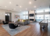 Thumbnail 23 of 23 - a living room with a couch and chairs and a table  at Centennial Crossing, Waukee, IA