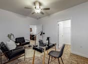 Thumbnail 7 of 23 - a living room with furniture and a ceiling fan at Centennial Crossing, Waukee, 50263