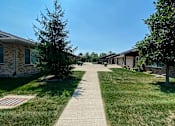 Thumbnail 4 of 16 - Walking Path at Cottages at Johnston Commons, Johnston Iowa  