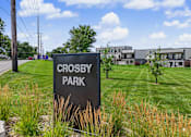 Thumbnail 34 of 34 - A sign that says Crosby Park in front of some houses.