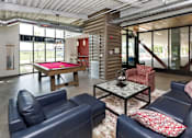 Thumbnail 34 of 42 - A room with a pool table and leather couches. at Eagle View Lofts, Iowa, 50309