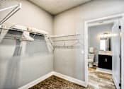 Thumbnail 18 of 31 - A bathroom with a towel rack and a mirror.