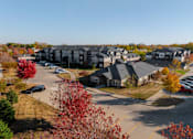 Thumbnail 41 of 50 - A parking lot with cars and apartment buildings in the background. at Stonegate Crossing Apartments, Clive, 50325