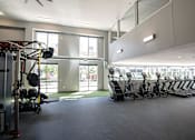 Thumbnail 26 of 34 - A gym with a row of treadmills and a weight rack.at Linc, Iowa, 50309