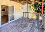 Thumbnail 18 of 90 - the deck of a home with a sliding glass door at Rosemont Place Apartments, Des Moines, 50320