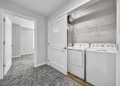 Thumbnail 16 of 30 - a white laundry room with two washes and a dryer at Soll, Des Moines, IA  