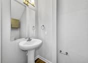 Thumbnail 15 of 30 - a white bathroom with a sink and a mirror at Soll, Des Moines, 50312  