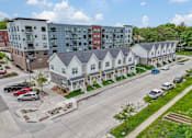Thumbnail 29 of 30 - an aerial view of apartment buildings on a city street at Soll, Iowa, 50312