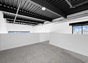 Thumbnail 92 of 99 - Carpeted Area at Plant 1 Lofts, Iowa, 50208
