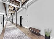 Thumbnail 82 of 99 - A long hallway at Plant 1 Lofts, N. Newton  