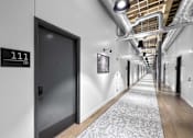 Thumbnail 81 of 99 - Long Hallway at Plant 1 Lofts, N. Newton, 50208  