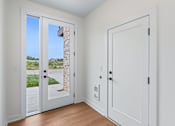 Thumbnail 58 of 77 - Entryway with glass door and interior access at The Flats at West Glen Apartments, West Des Moines, IA 50266