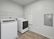 Thumbnail 20 of 53 - A white dishwasher and microwave in a kitchen.