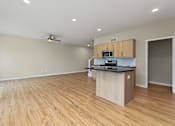 Thumbnail 3 of 34 - Spacious townhome with large living room and kitchen island