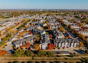 Thumbnail 44 of 51 - an aerial view of a neighborhood with houses and trees at 92West, Iowa, 50266