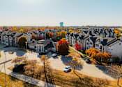Thumbnail 42 of 51 - an aerial view of a neighborhood with houses and trees
