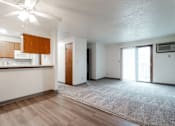 Thumbnail 23 of 57 - A room with a ceiling fan and a carpeted floor. at Bristol Ridge, Urbandale, 50322