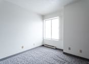 Thumbnail 17 of 57 - A room with a window and a radiator on the floor. at Bristol Ridge, Urbandale, Iowa