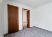 Thumbnail 19 of 57 - Carpeted Bedroom at Bristol Ridge, Urbandale