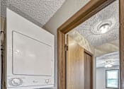 Thumbnail 32 of 33 - a laundry room with a washer and dryer in it at Creekstone Falls, Sioux Falls