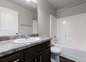 Thumbnail 23 of 30 - A bathroom with a sink, toilet, and bathtub. at Danamere Village, Carlisle