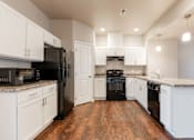 Thumbnail 21 of 30 - White Kitchen at Danamere Village, Iowa, 50047