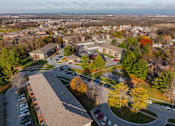 Thumbnail 86 of 90 - A view of a residential area with apartment buildings and trees. at Rosemont Place Apartments, Des Moines, Iowa